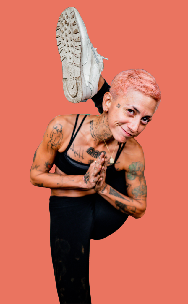 Caro Lokah profile picture with pink hair and pink background. She has her leg over her head and her hands in prayer. At a Chandra Vida yoga retreat.