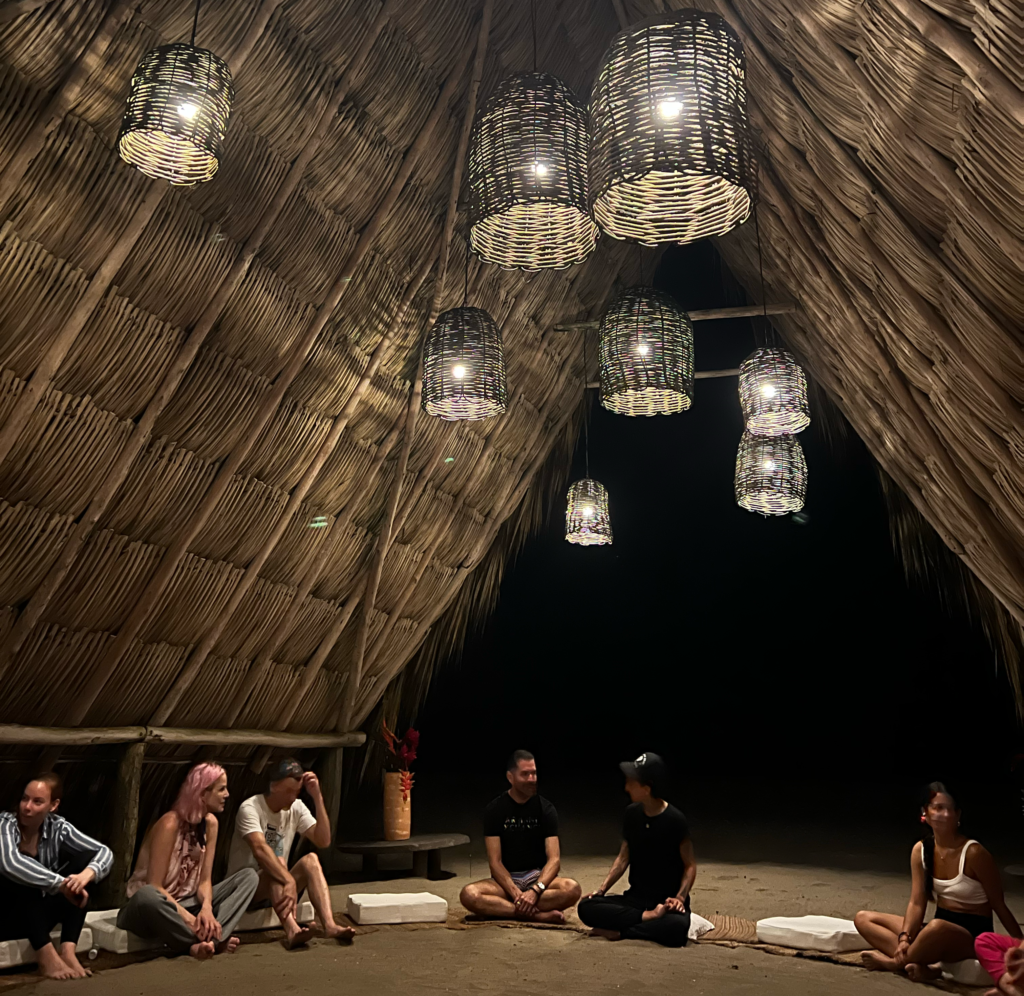 Students await meditation in the shala in colombia. At a Chandra Vida yoga retreat.