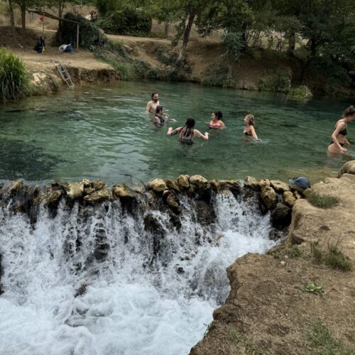 Chandra Vida students take a quick dip in a beautiful spring in tuscany.